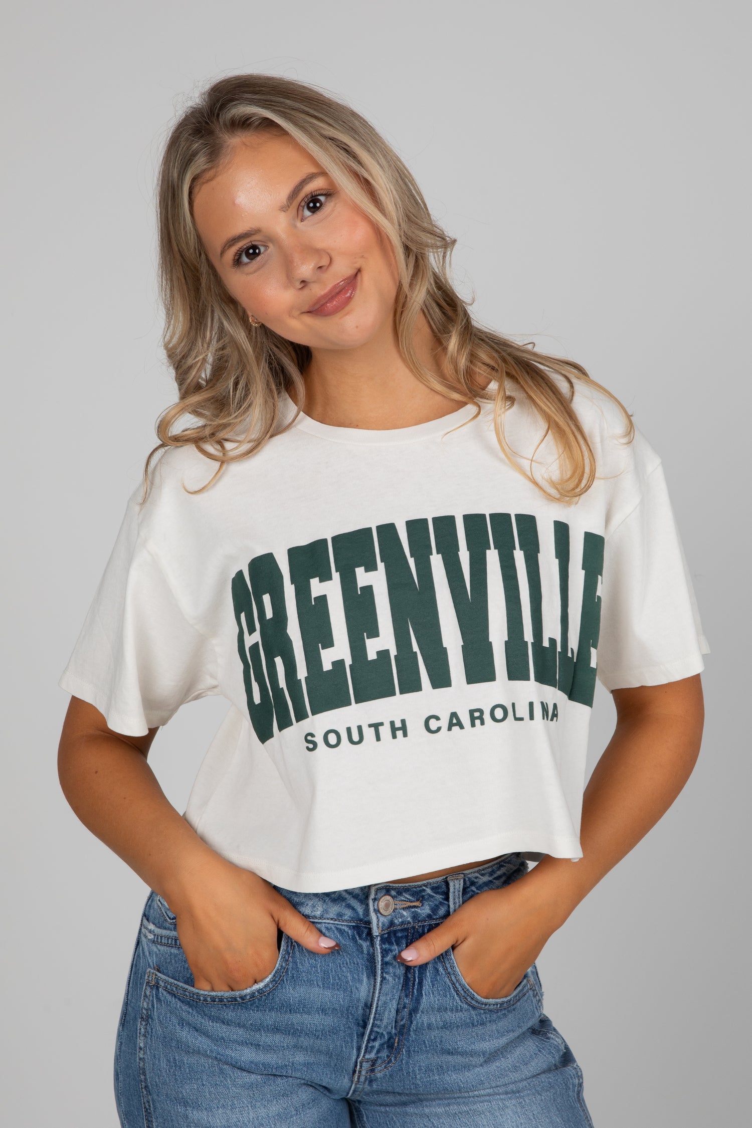 Woman wearing a white t-shirt with &