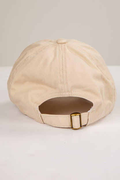 Beige baseball cap on a white background