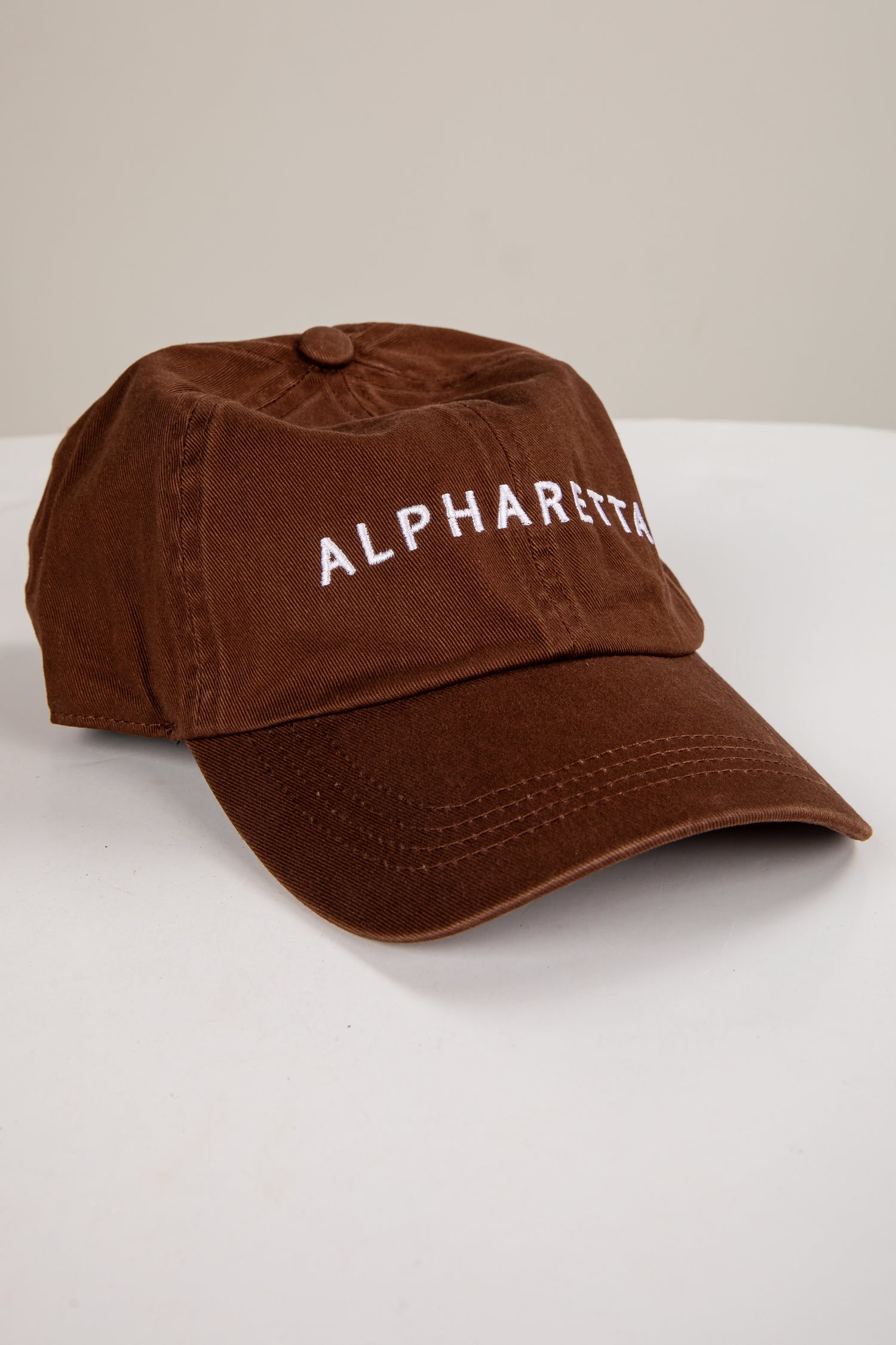 Brown cap with &