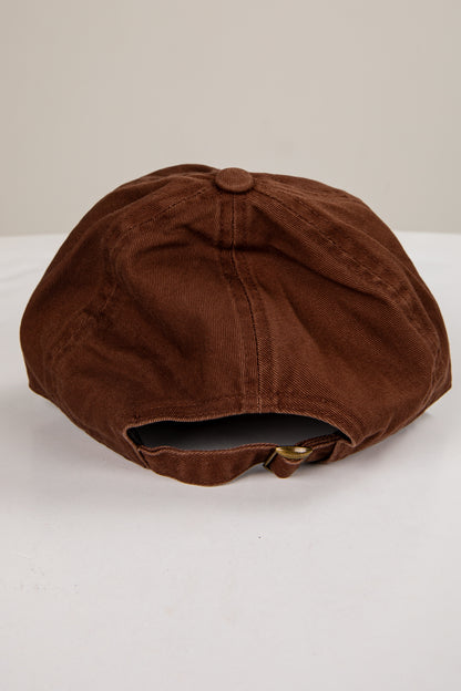 Brown cap on a white background