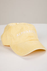 Yellow cap with &