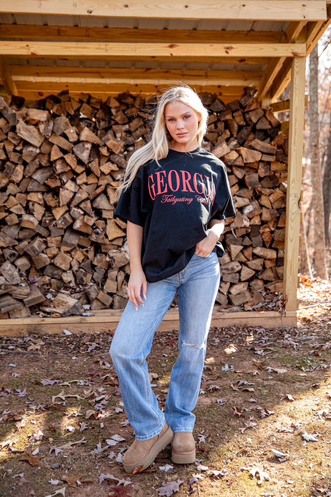 Woman wearing a black t-shirt with &