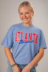 Person wearing a blue &