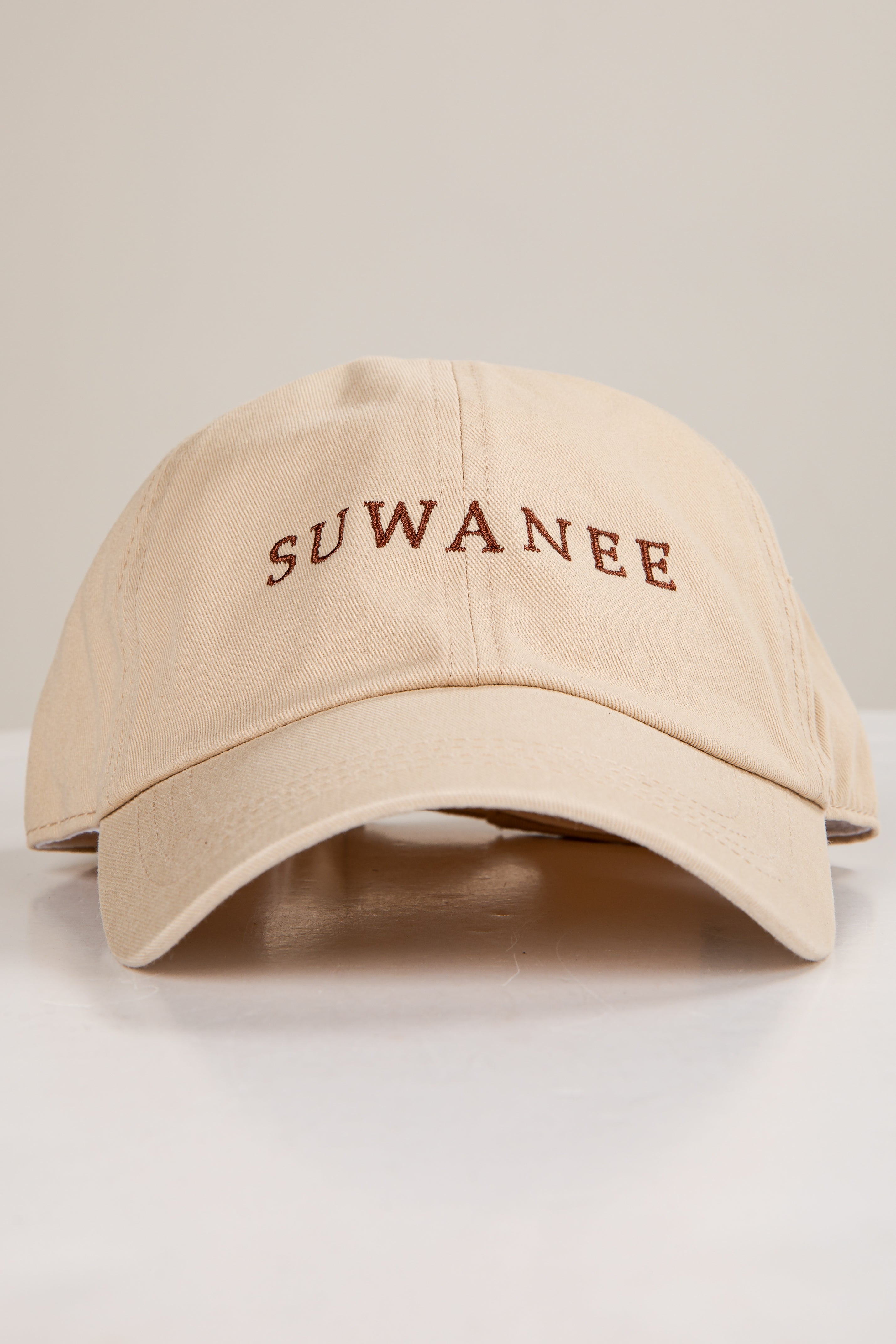 Beige cap with &