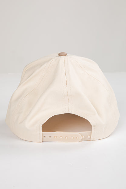 Beige cap on a white background
