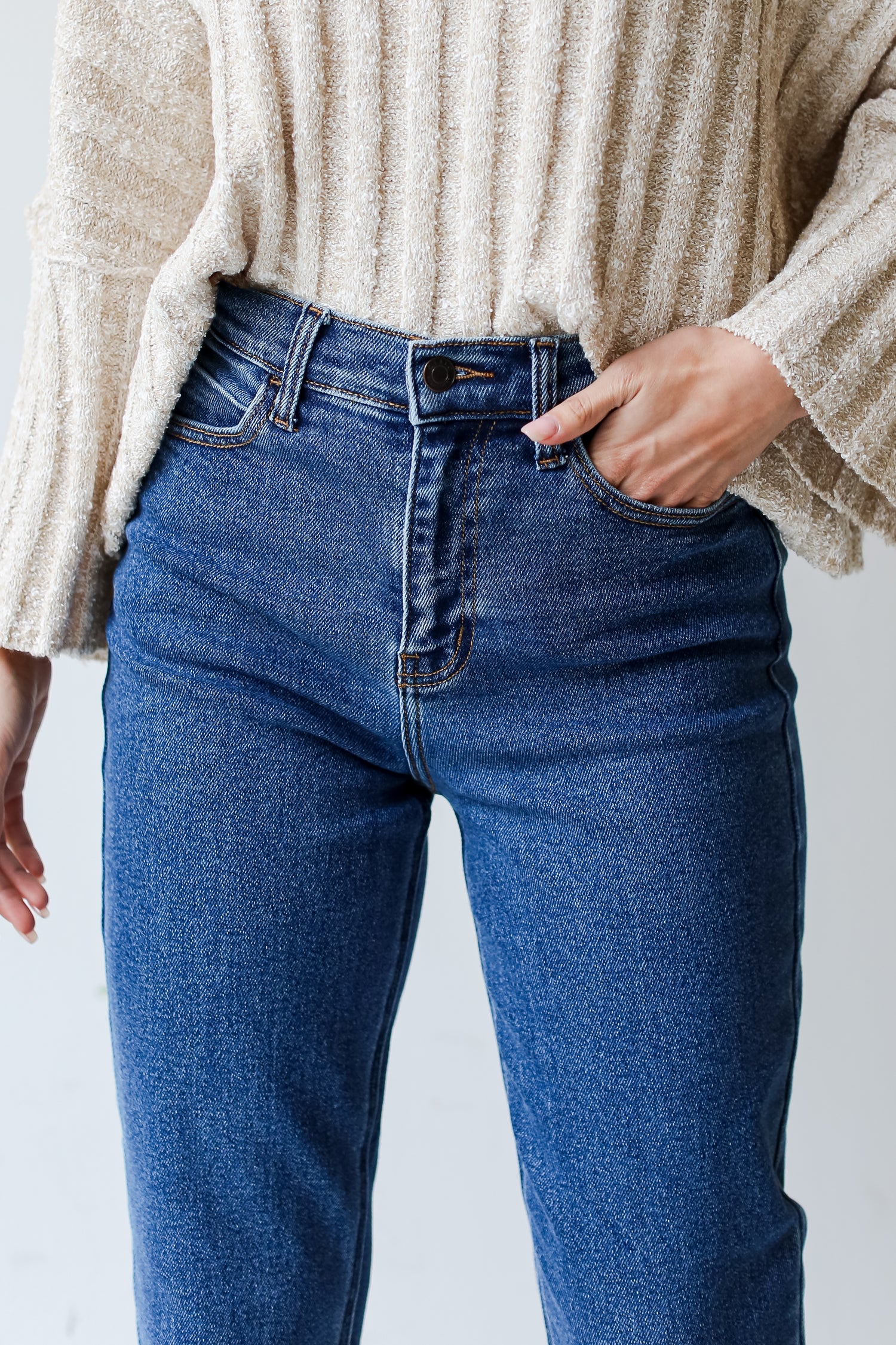 model wearing dark wash Mom Jeans