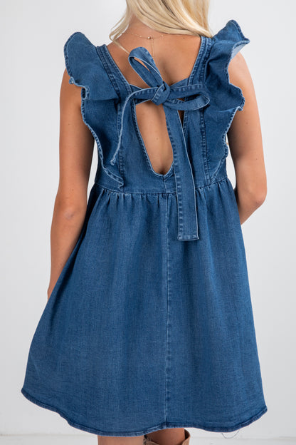 Blue denim dress with ruffled straps and open back on a white background
