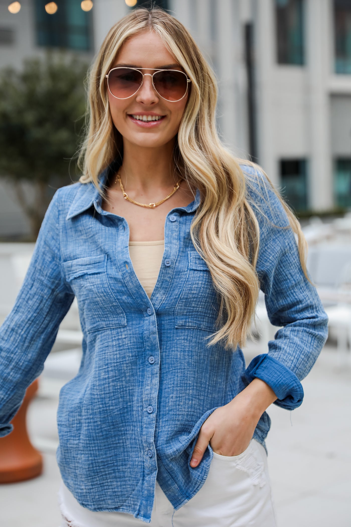 Morgan Denim Linen Button-Up Blouse features, Lightweight Crinkle Linen Fabrication, Acid Washed, Collared Neckline, Functional Button Front long Sleeves with Functional Button Cuffs