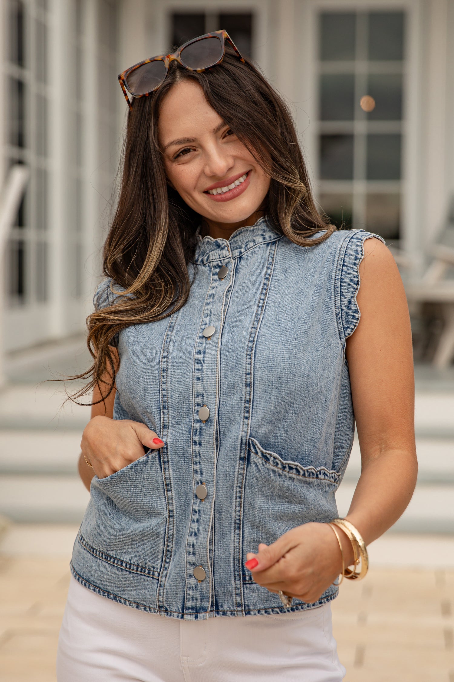 Woman wearing a denim vest outdoors