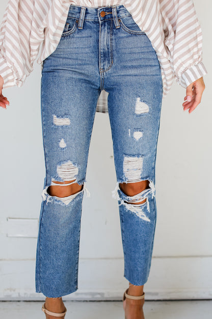 medium wash Distressed Mom Jeans close up