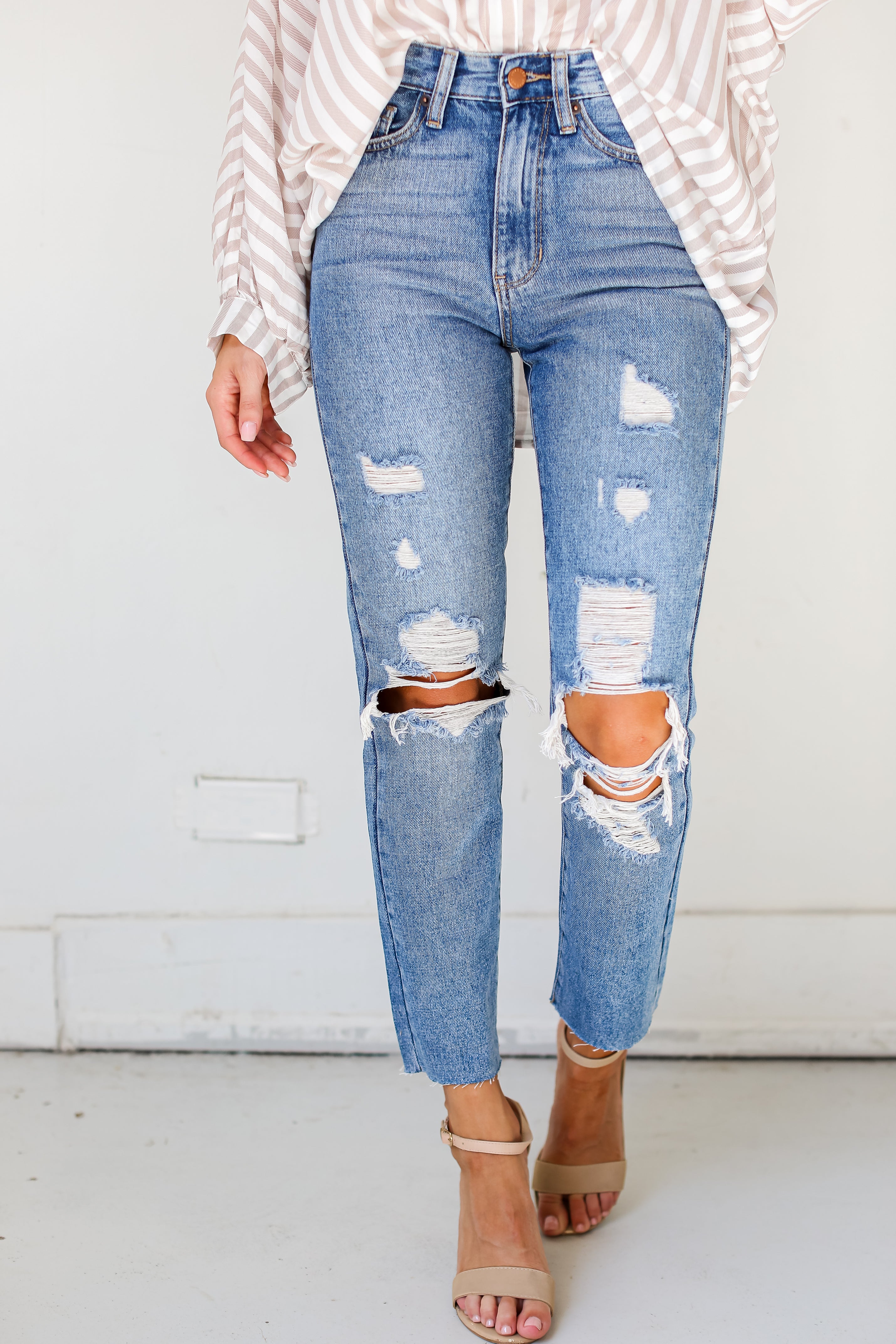 medium wash Distressed Mom Jeans close up view