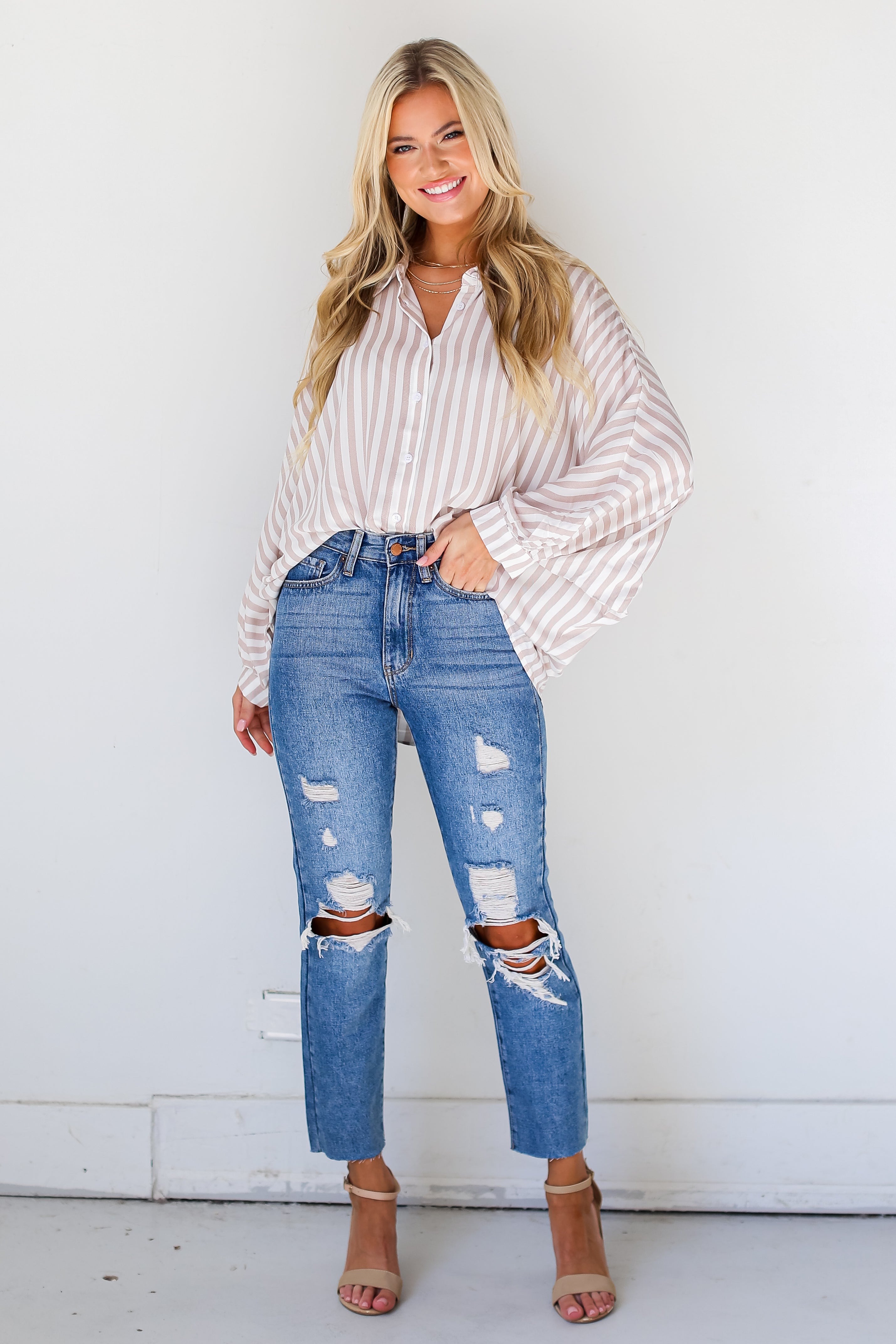 medium wash Distressed Mom Jeans with heels