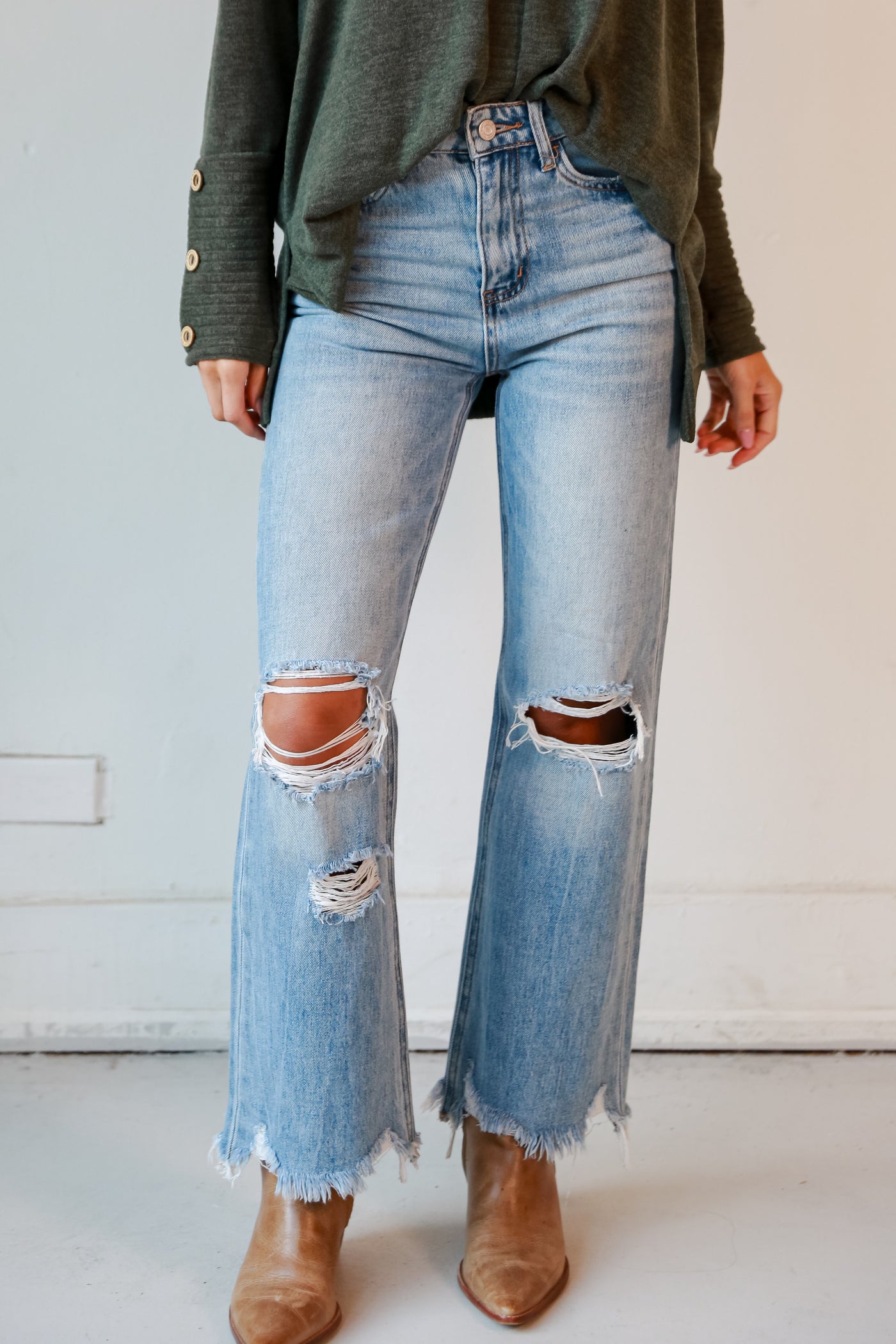 Medium Wash 90s Vintage Distressed Flare Jeans closes up