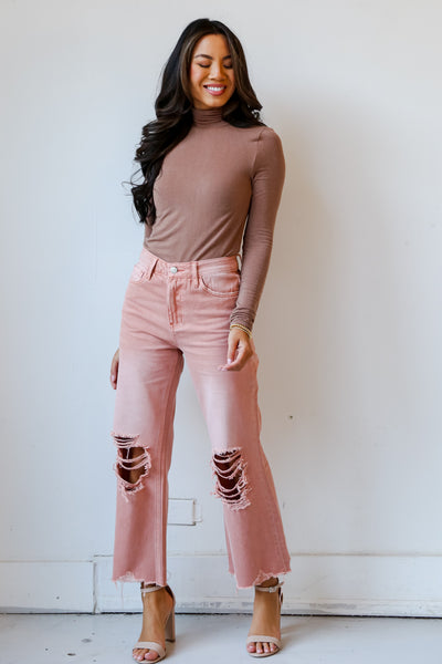 Mauve Distressed Flare Jeans on model