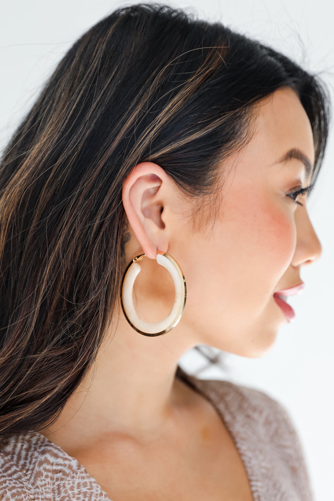 Gold Acrylic Hoop Earrings on model