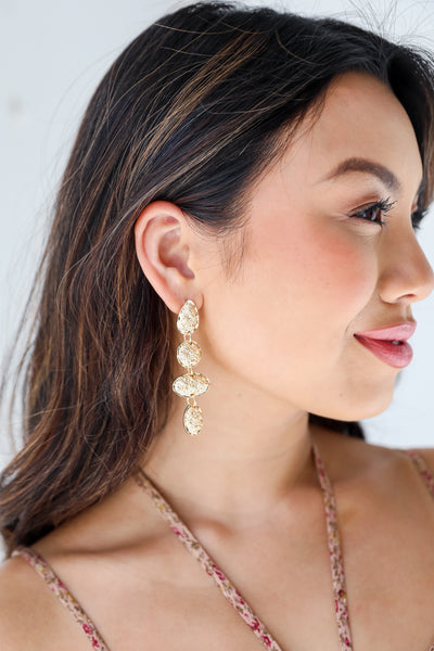 Gold Drop Earrings on model