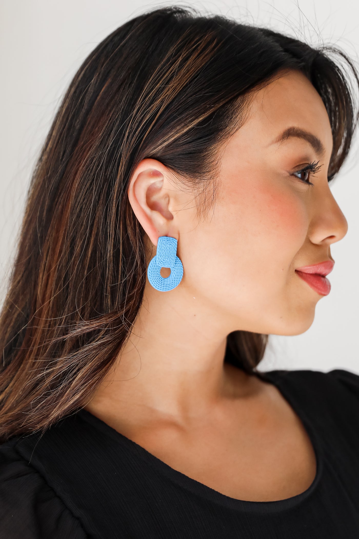 blue Statement Earrings on model