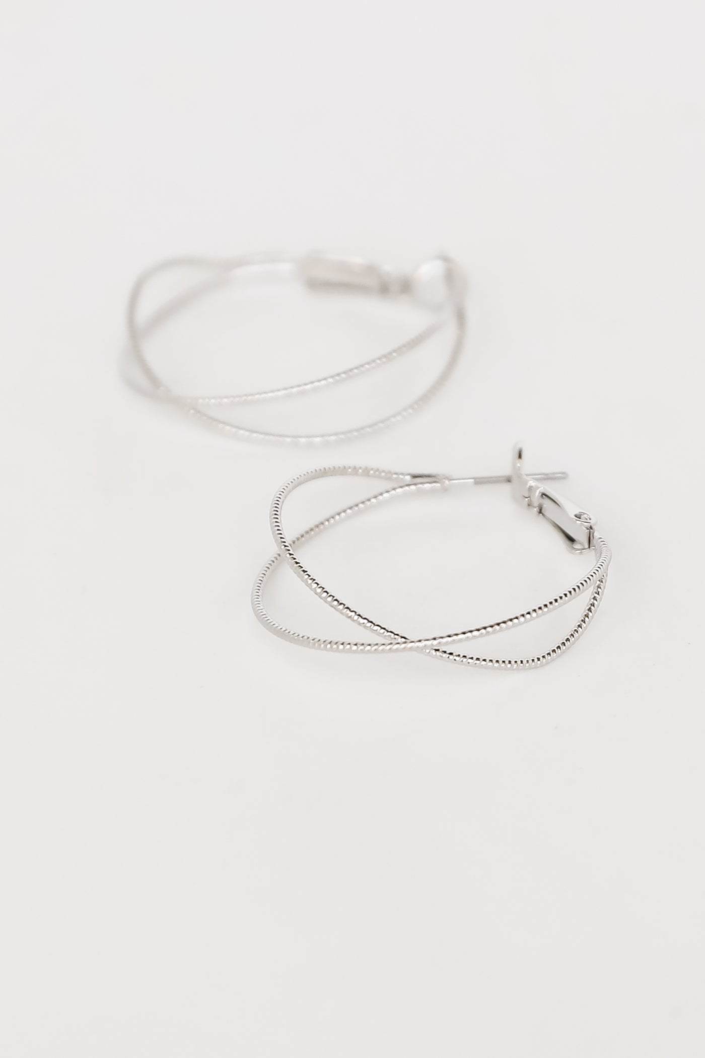 Silver Double Hoop Earrings flat lay