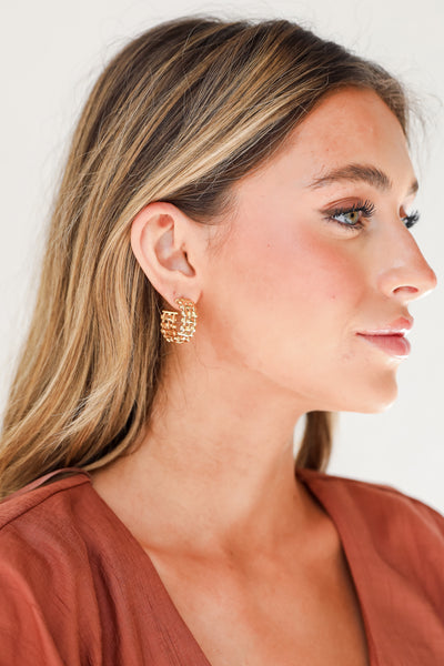 Gold Woven Hoop Earrings on model