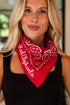 Woman wearing a red bandana with &