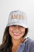 Woman wearing a cap with &