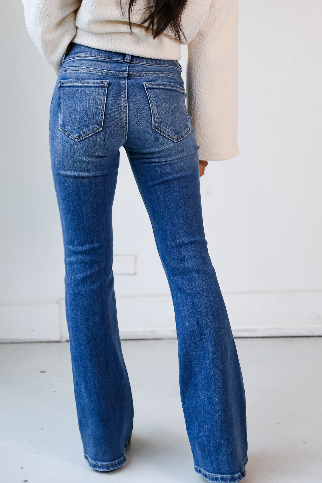 Medium Wash Distressed Flare Jeans back view
