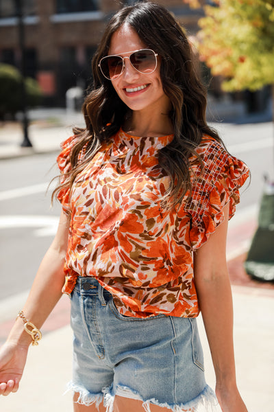 rust Floral Ruffle Sleeve Blouse on model