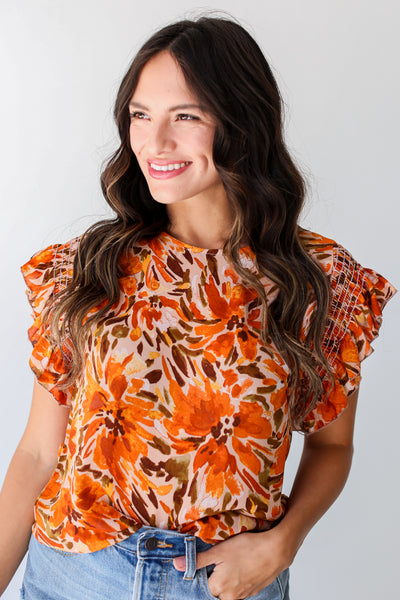 rust Floral Ruffle Sleeve Blouse close up