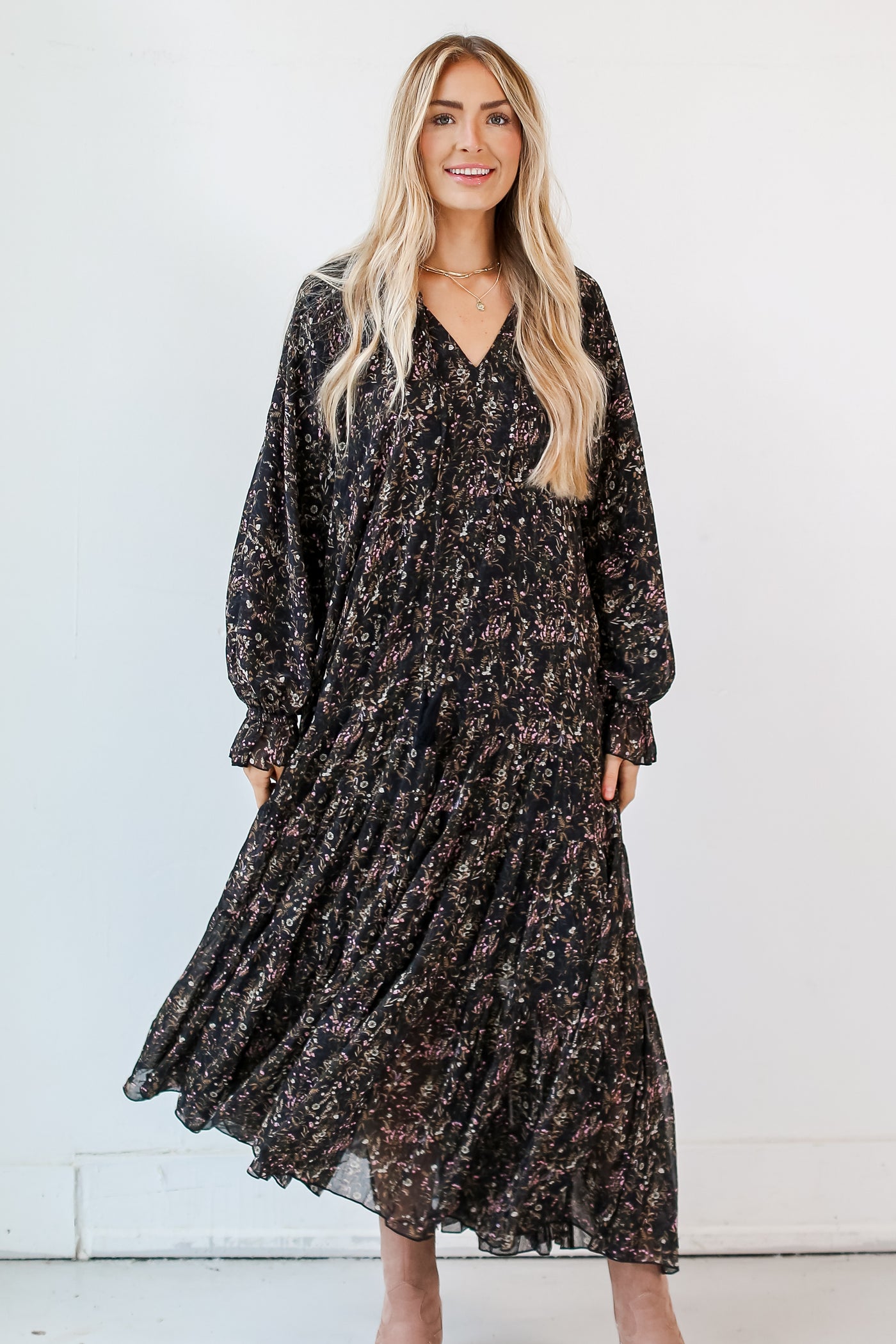 model wearing a Black Floral Maxi Dress
