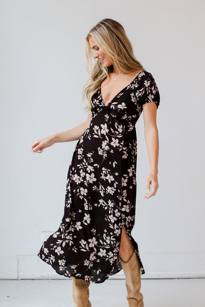 model wearing a Black Floral Midi Dress