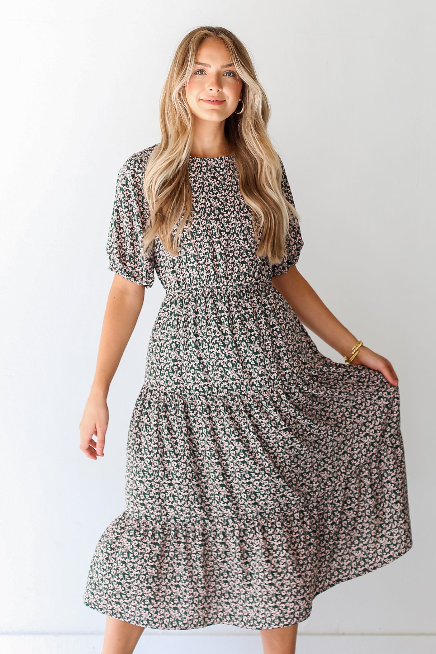 model wearing a Tiered Floral Midi Dress