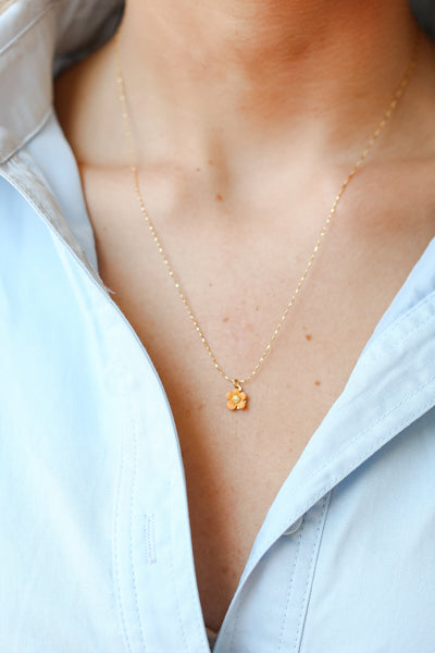 Gold Flower Charm Necklace close up