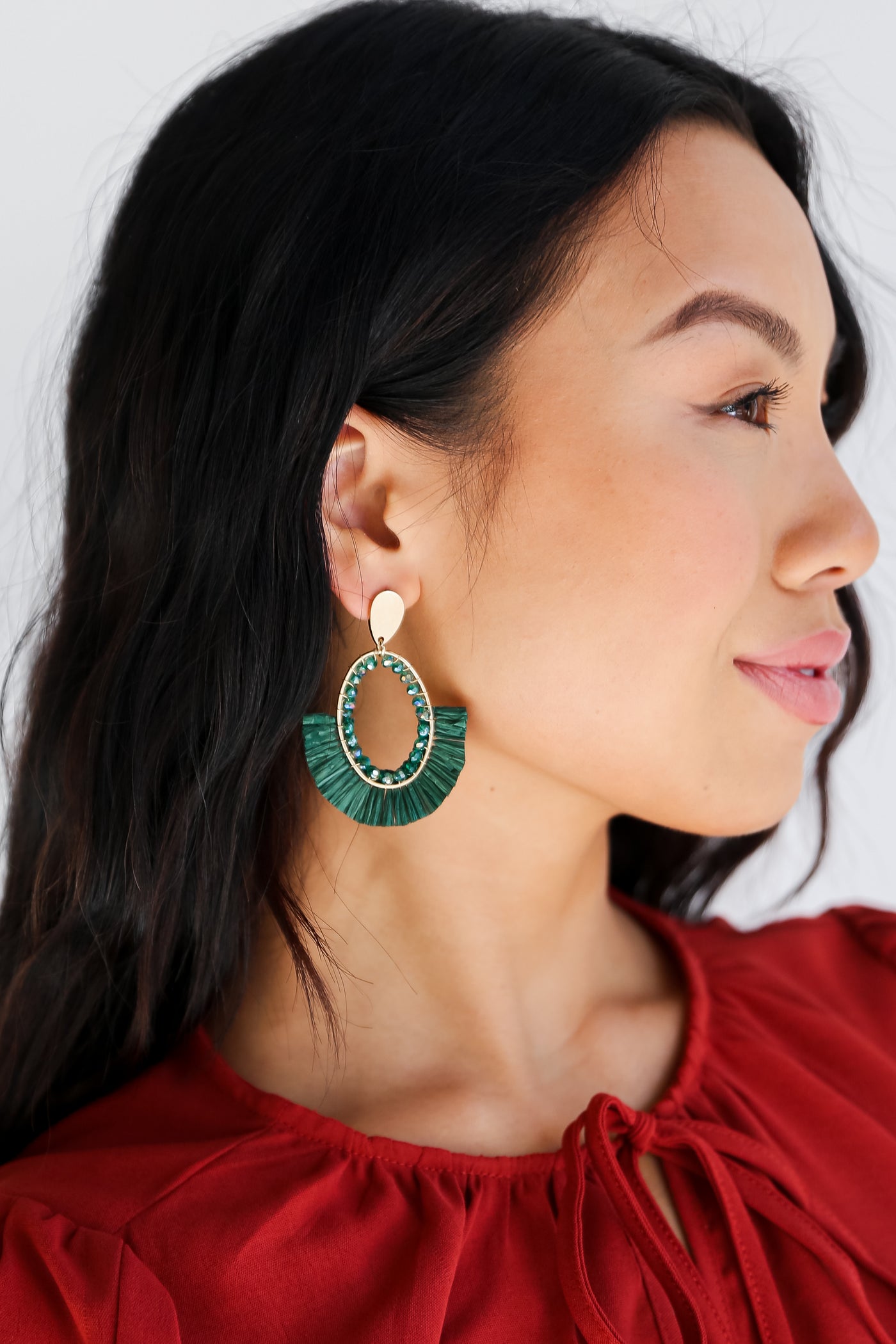 Green Fringe Statement Earrings on model