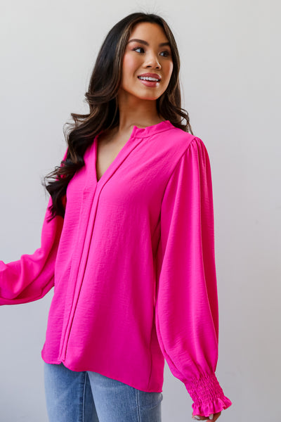 bright pink blouse