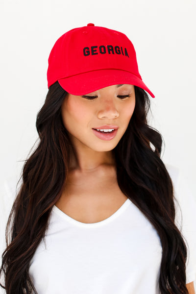 red Georgia Embroidered Hat on dress up model