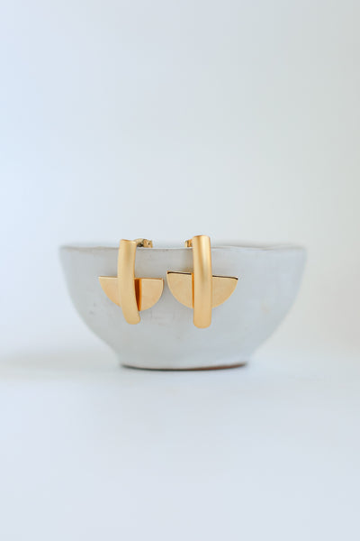 Gold Abstract Earrings flat lay