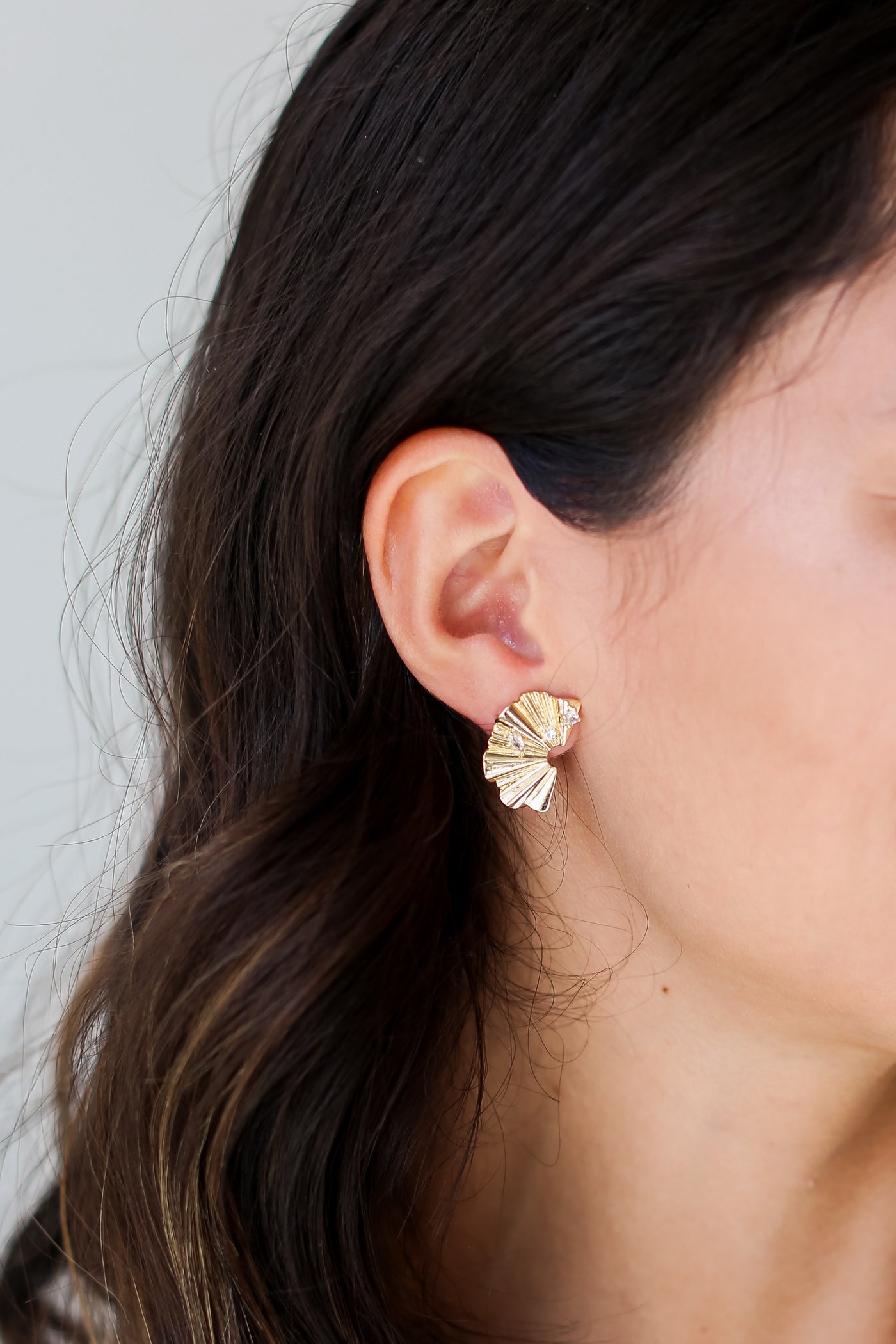 Gold Statement Stud Earrings on model