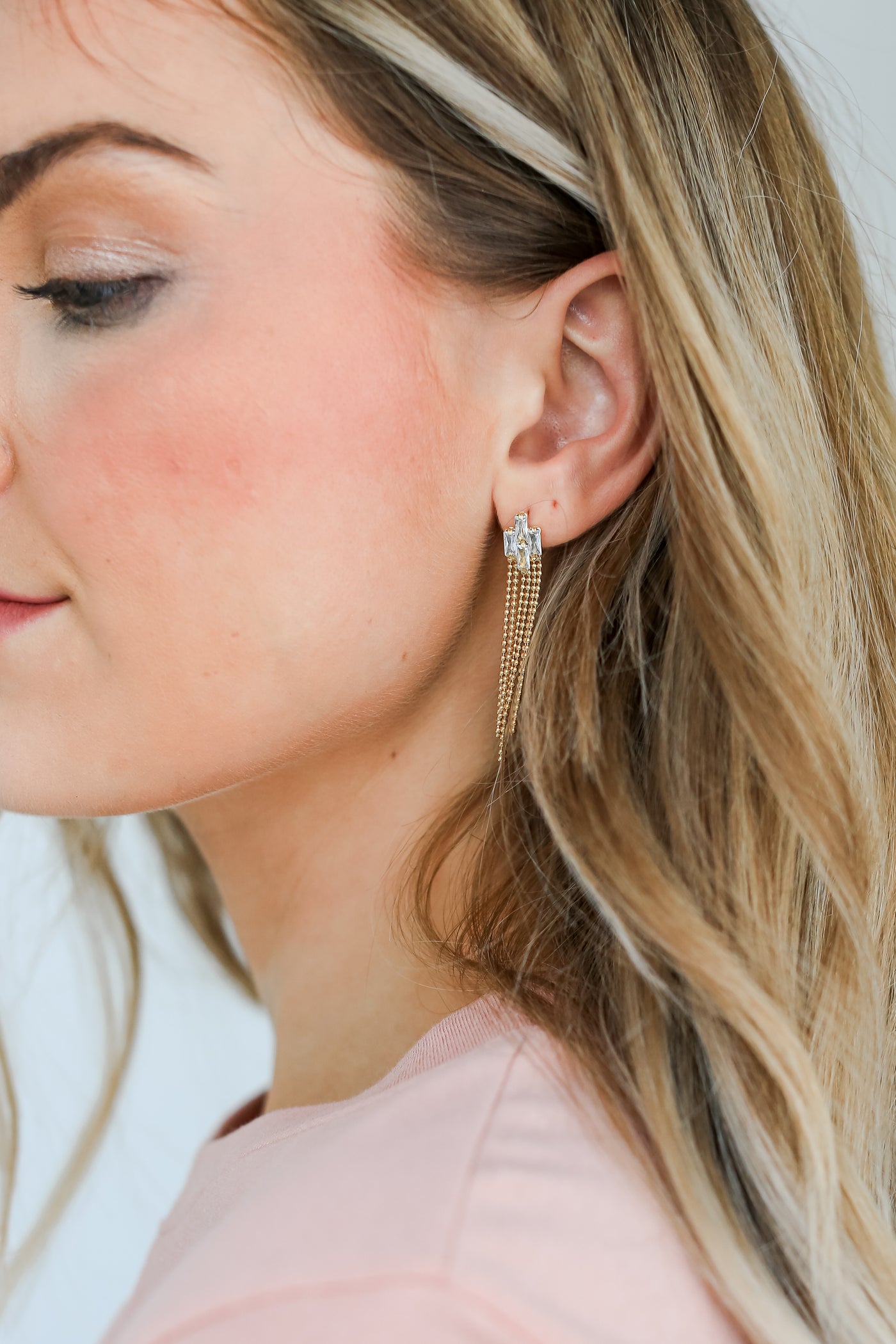 Gold Rhinestone Beaded Fringe Earrings on model