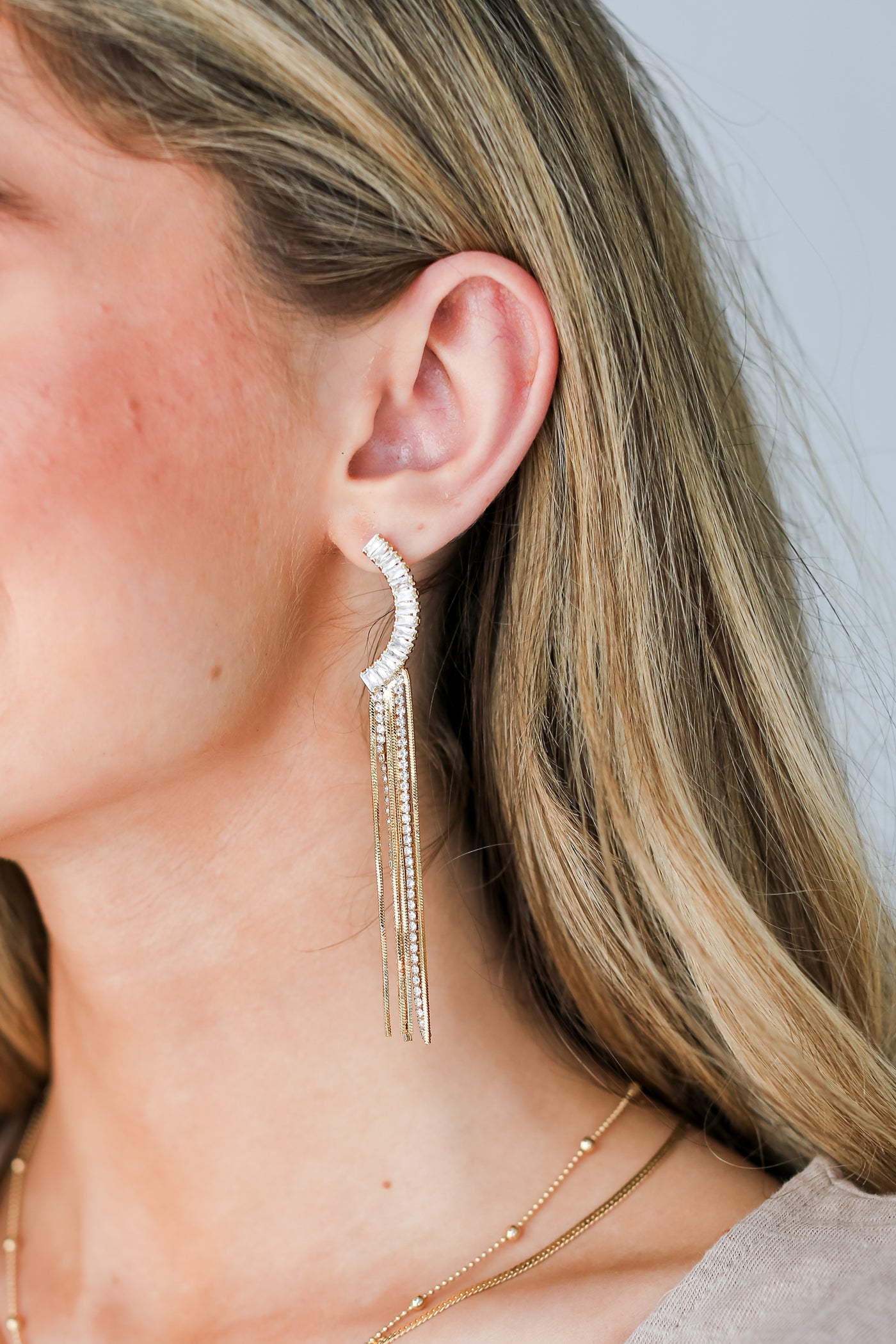 Gold Rhinestone Fringe Earrings on dress up model