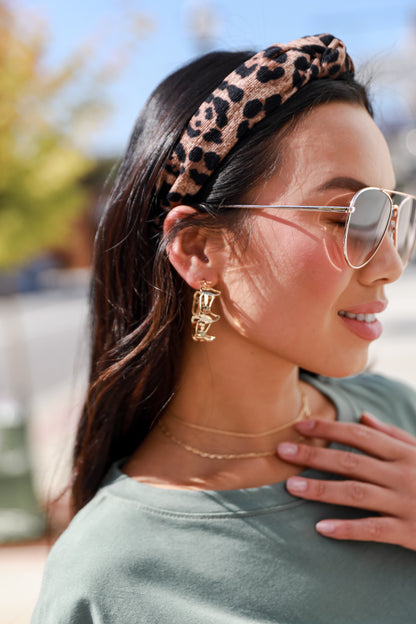 Gold Cowboy Boot Hoop Earrings close up