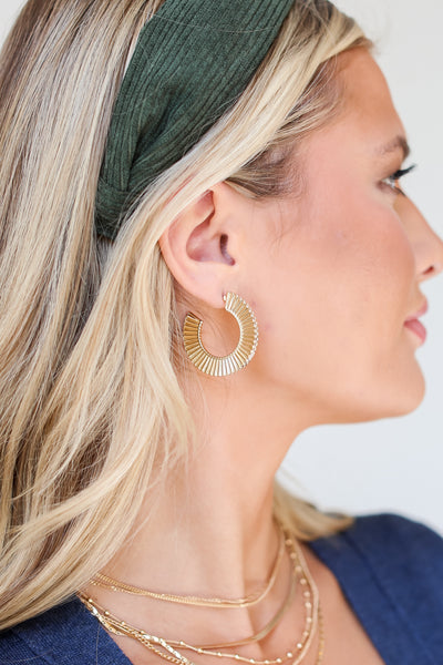 Gold Statement Hoop Earrings on model