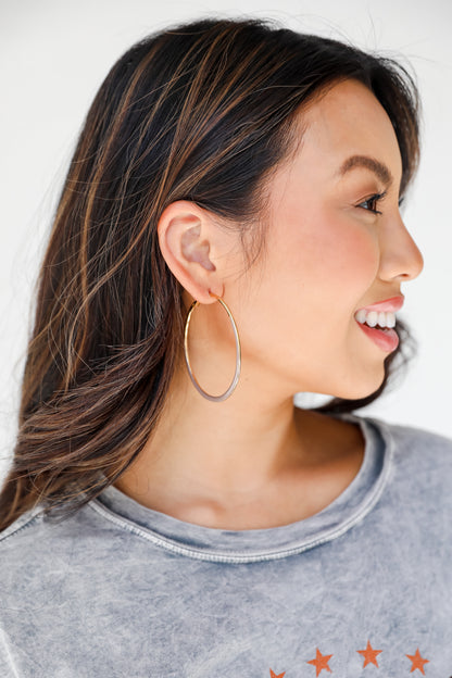 Gold Hoop Earrings on model