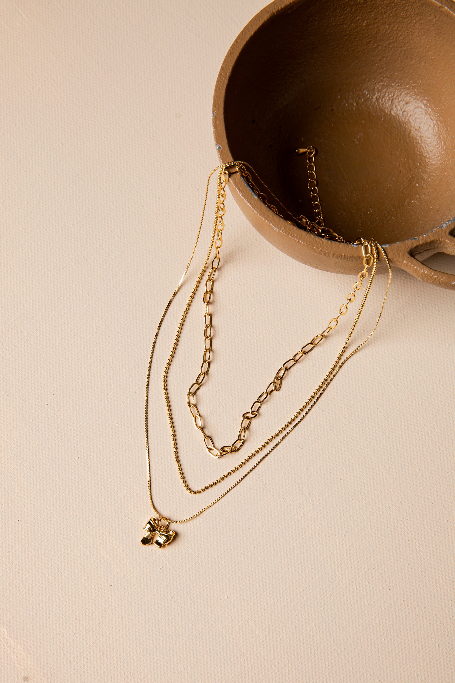 Lilah Golden Bow Layered Necklace | Trendy Women's Jewelry | Dress Up Lilah Golden Bow Layered Necklace | Trendy Women's Jewelry | Dress Up