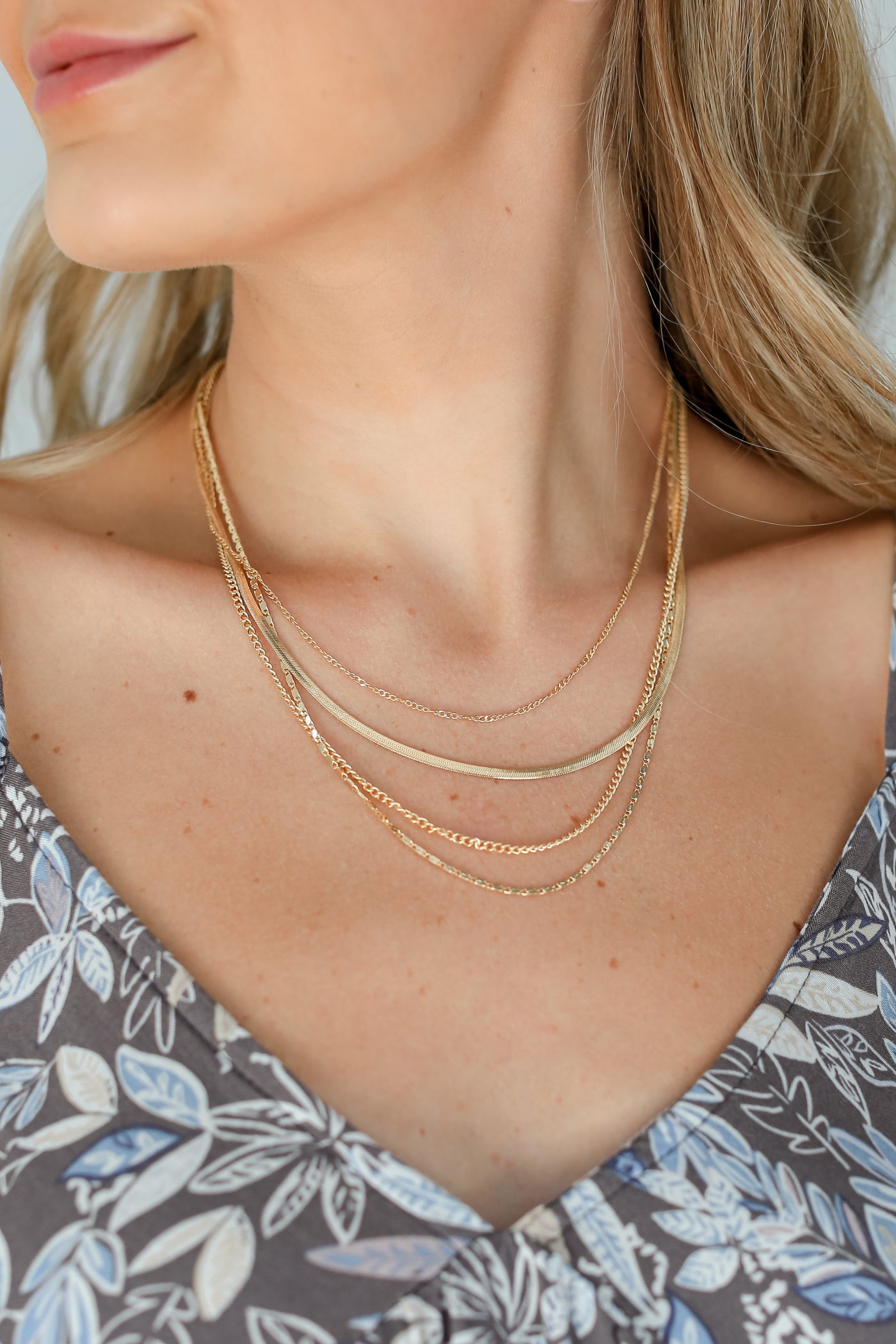 Gold Layered Necklace on model
