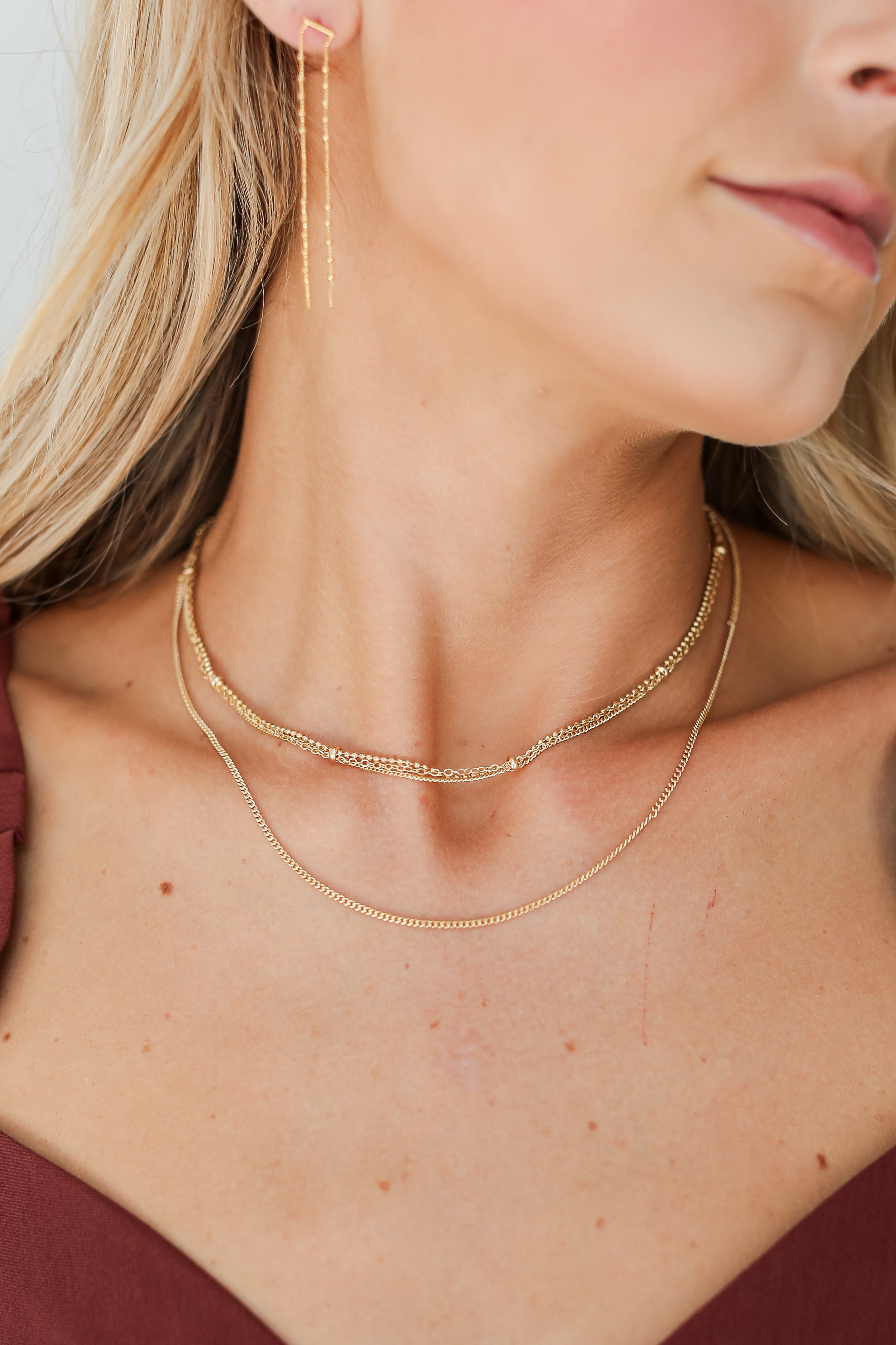 Gold Layered Chain Necklace on model