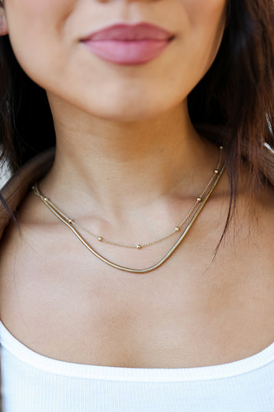 Gold Layered Chain Necklace on model