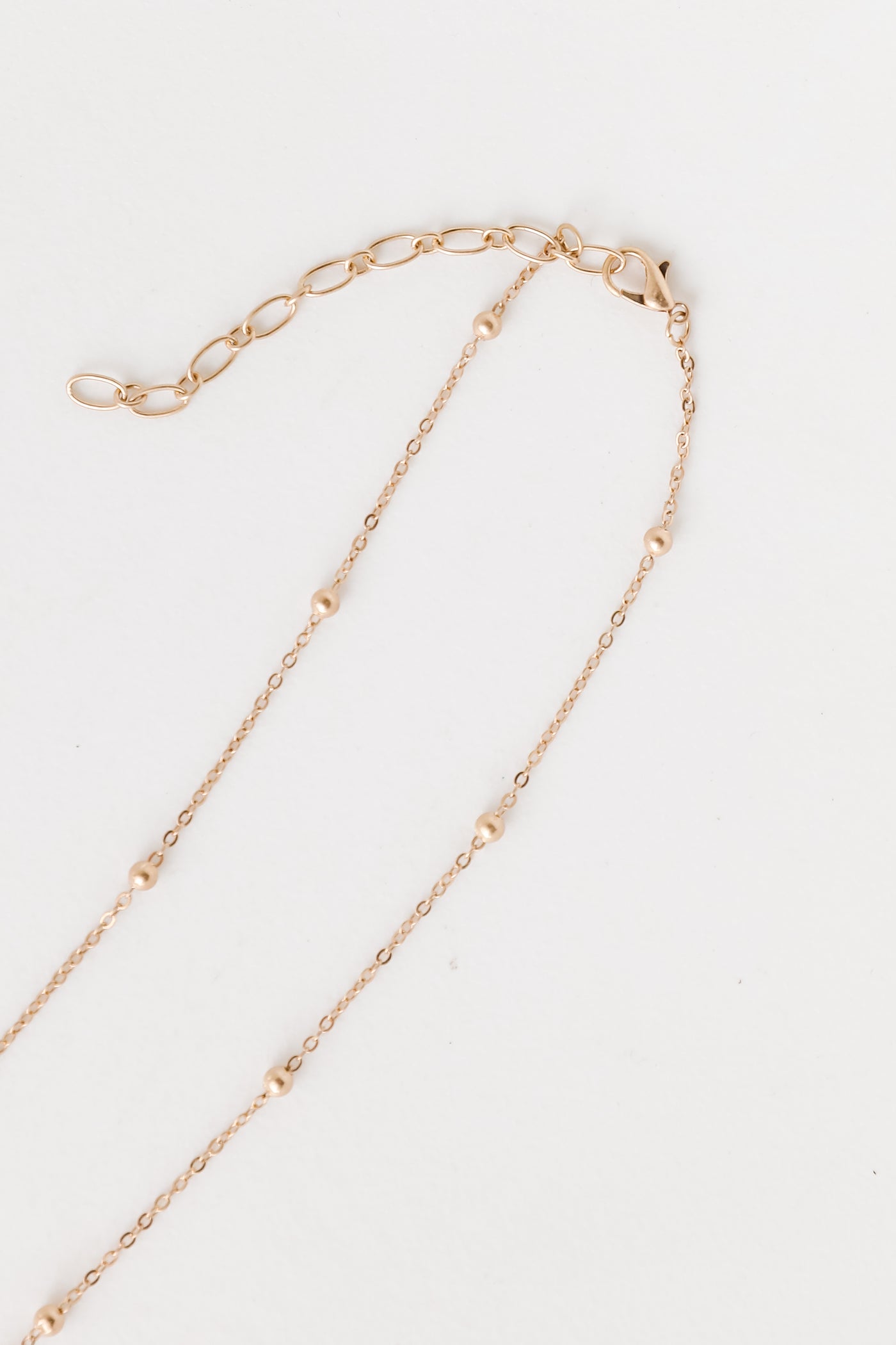 Gold Stone Necklace flat lay