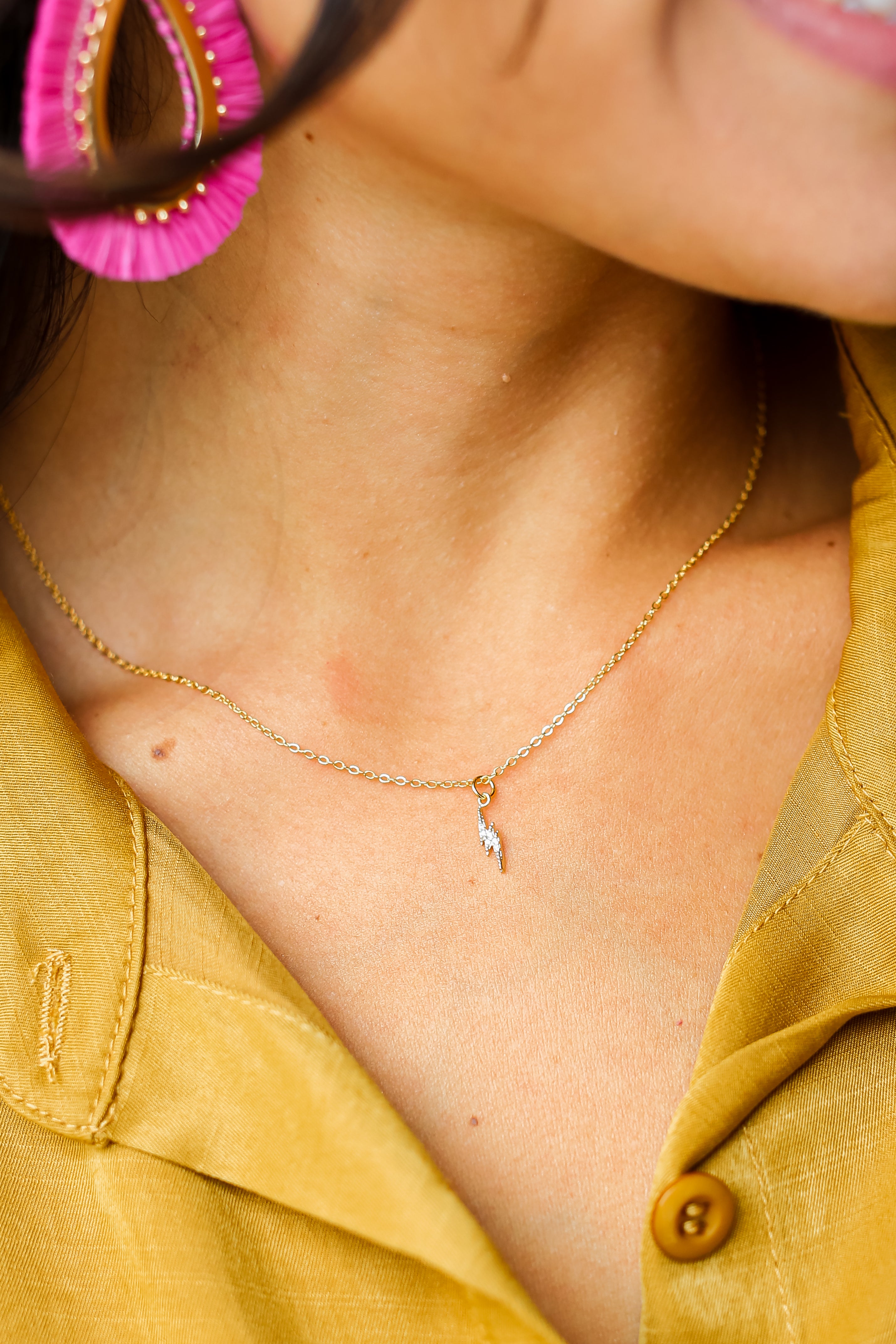 Gold Rhinestone Lightning Bolt Charm Necklace close up