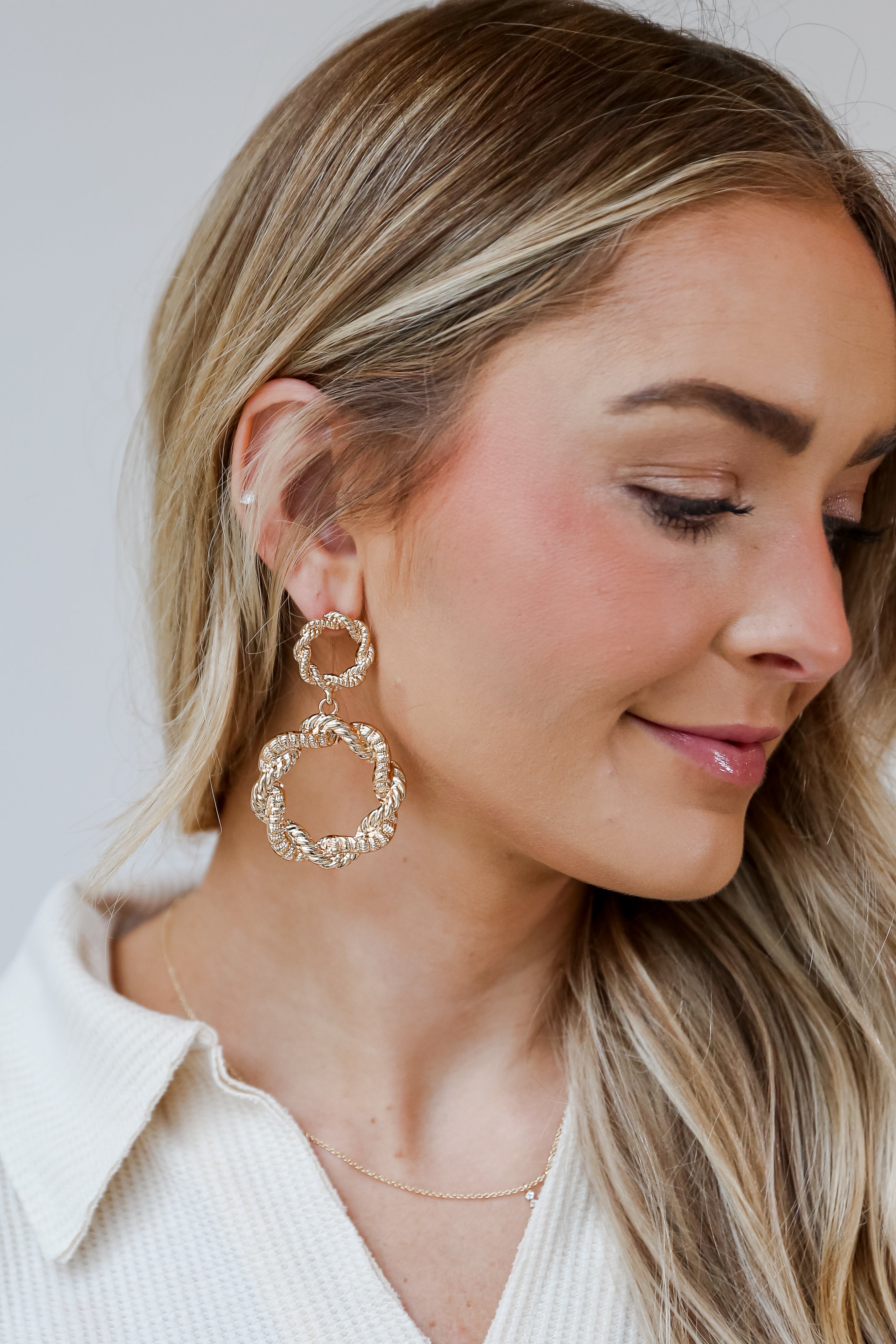 Gold Statement Drop Earrings on model