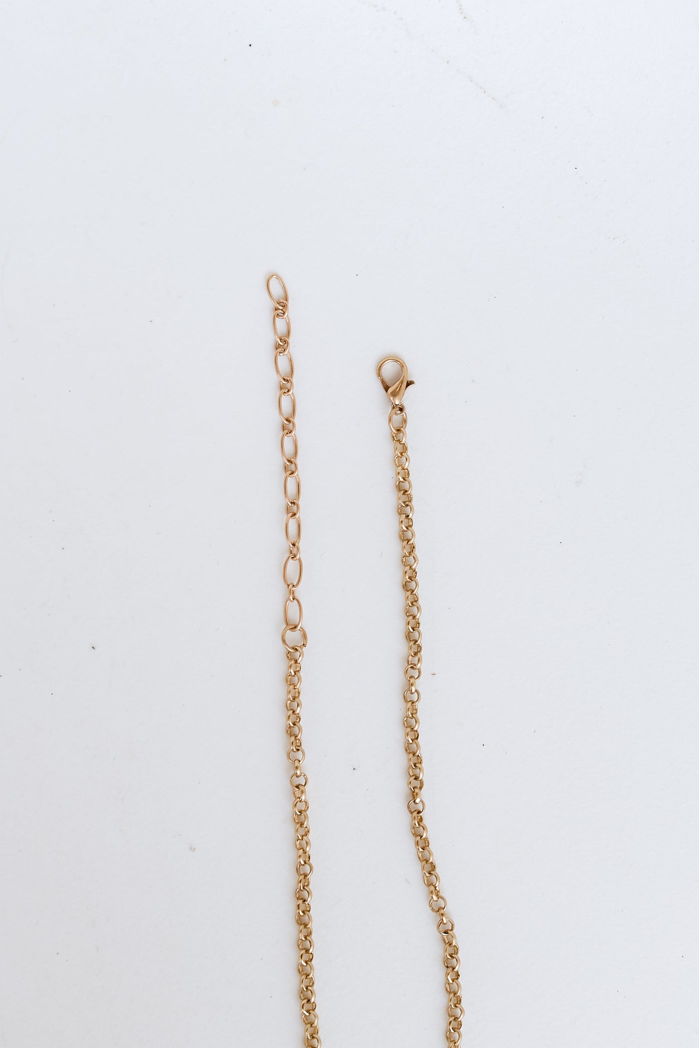 gold Beaded Necklace flat lay
